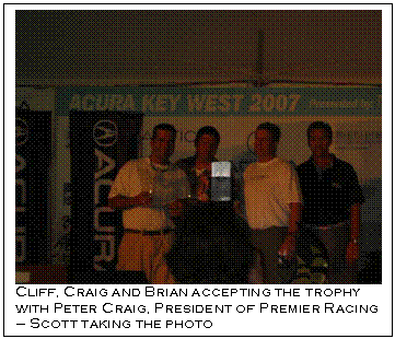 Text Box:  
Cliff, Craig and Brian accepting the trophy 
with Peter Craig, President of Premier Racing 
– Scott taking the photo
