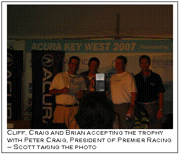 Text Box:  
Cliff, Craig and Brian accepting the trophy 
with Peter Craig, President of Premier Racing 
 Scott taking the photo
